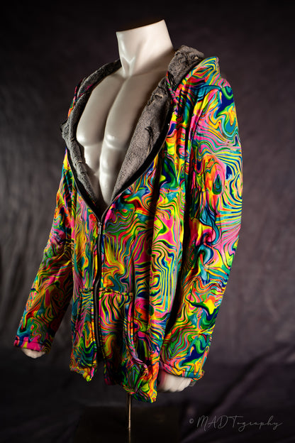 Colorful fluorescent rainbow jacket with a wavy pattern on a mannequin against a dark background