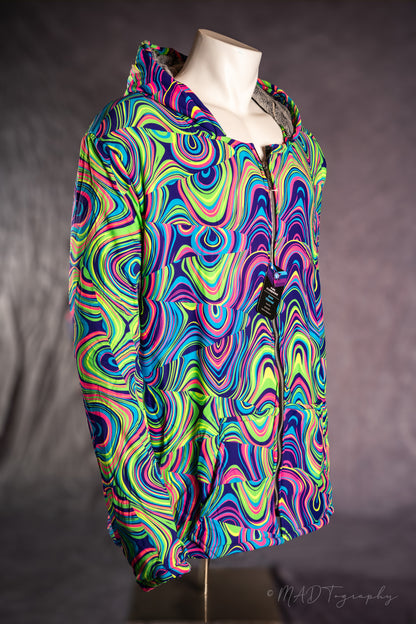 Colorful fluorescent jacket on a mannequin against a gray background