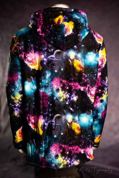 Hoodie with colorful galaxy design on a dark background