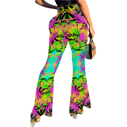 Colorful tie-dye pants with cat pattern worn by a person on a white background
